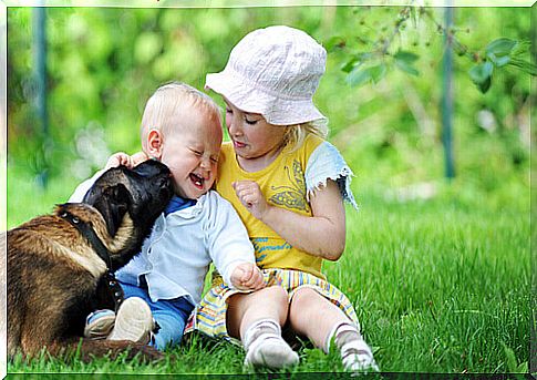 children playing with dog