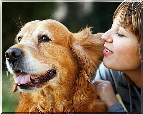 woman talking to her dog